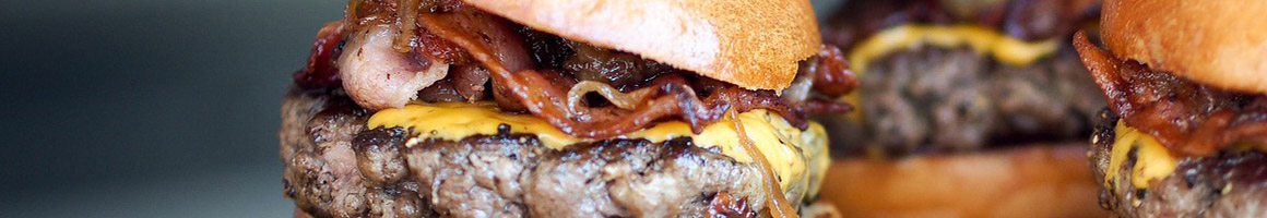 Eating American (New) Burger Hot Dog at Boardwalk Fries & Burgers restaurant in Halethorpe, MD.